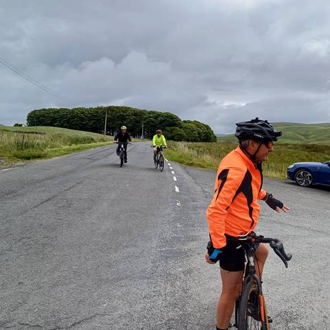 Cycling along minor road.